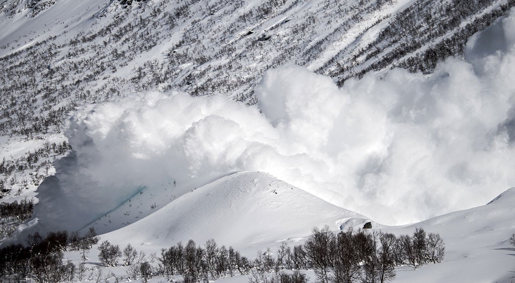 Triggered snow avalanche at NGI's research facility Ryggfonn, western Norway. 